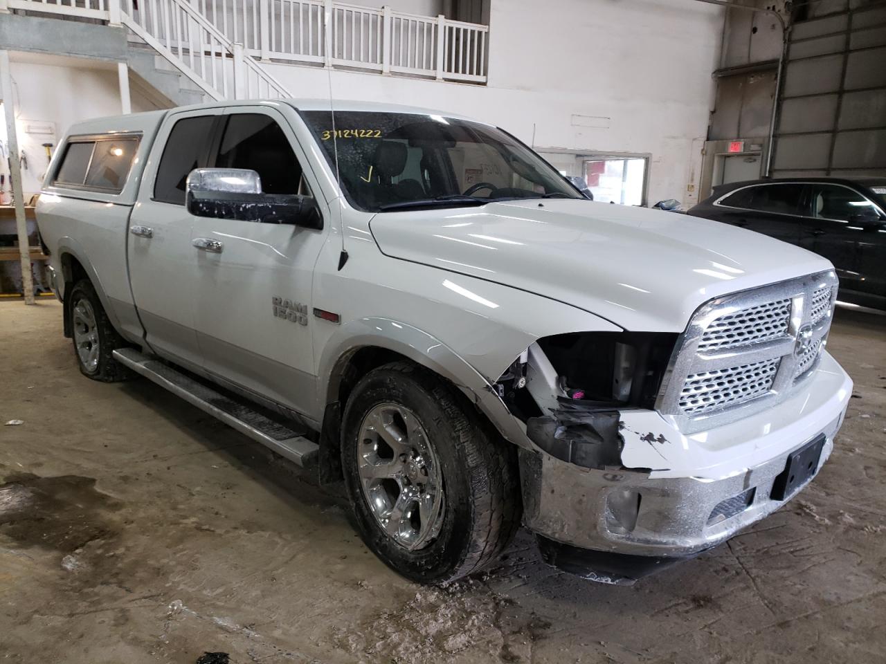 RAM 1500 LARAM 2015 with VIN 1C6RR7JM4FS744499 - Photo from auction