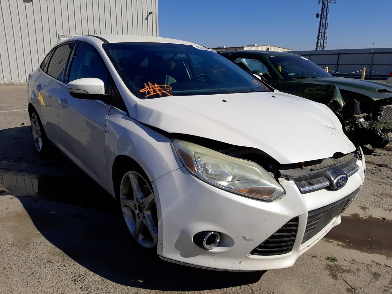Photo 1 from auction – 2013 FORD FOCUS TITA with VIN 1FADP3J26DL335188