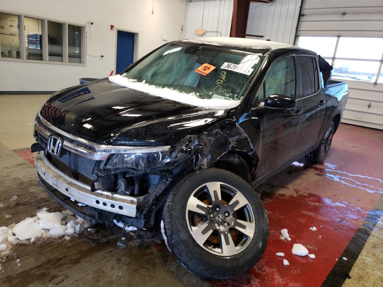 Photo 2 from auction – 2017 HONDA RIDGELINE with VIN 5FPYK3F59HB023394