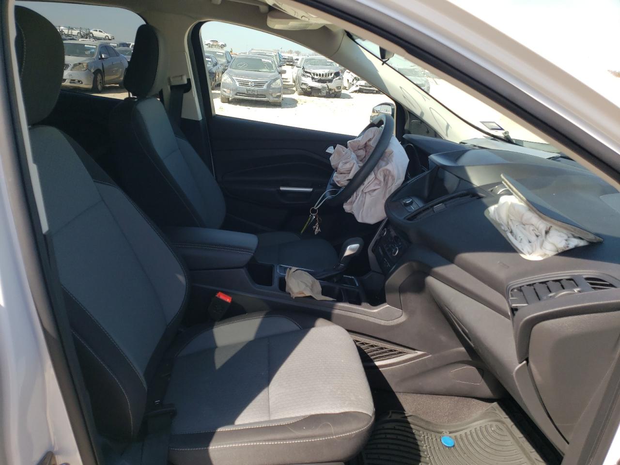 Photo 5 from auction – 2019 FORD ESCAPE SE with VIN 1FMCU9GD8KUC09878