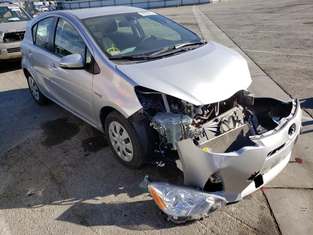 TOYOTA PRIUS C 2012 with VIN JTDKDTB35C1516620 - Photo from auction