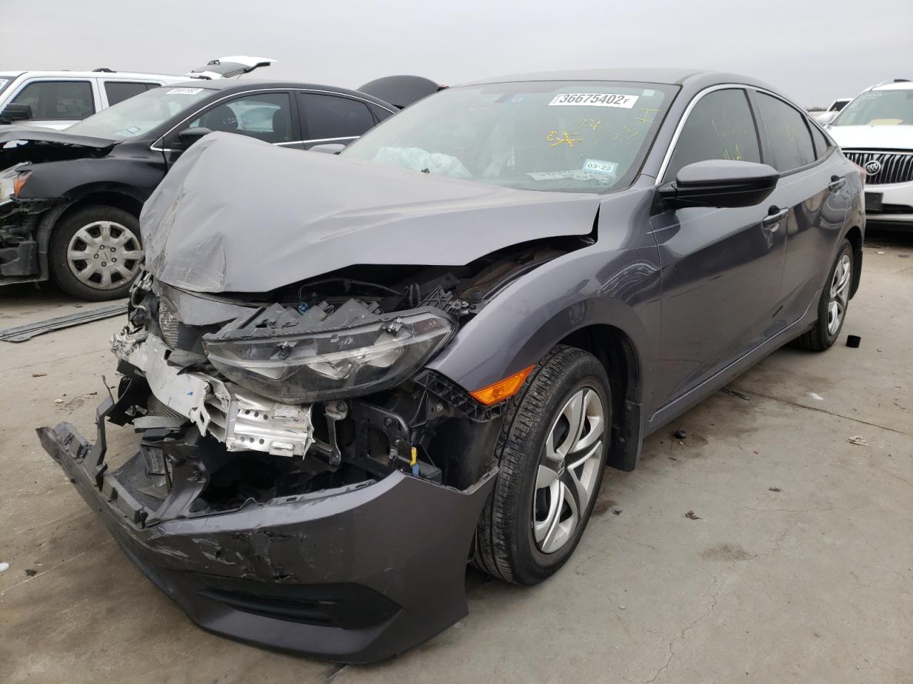 Photo 2 from auction – 2018 HONDA CIVIC LX with VIN 19XFC2F54JE018199