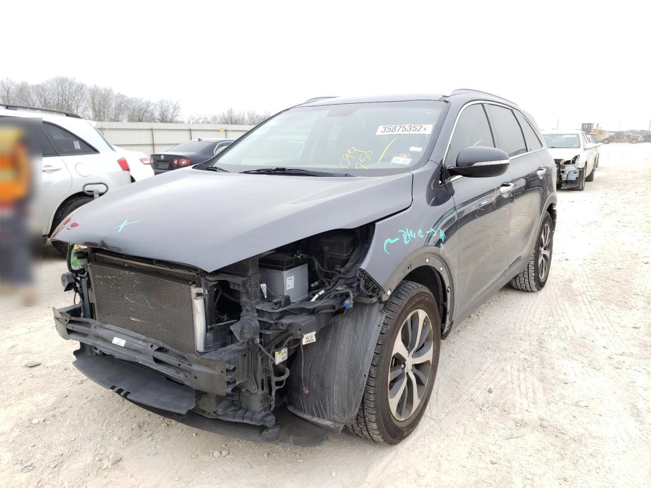 Photo 2 from auction – 2016 KIA SORENTO EX with VIN 5XYPH4A51GG099750