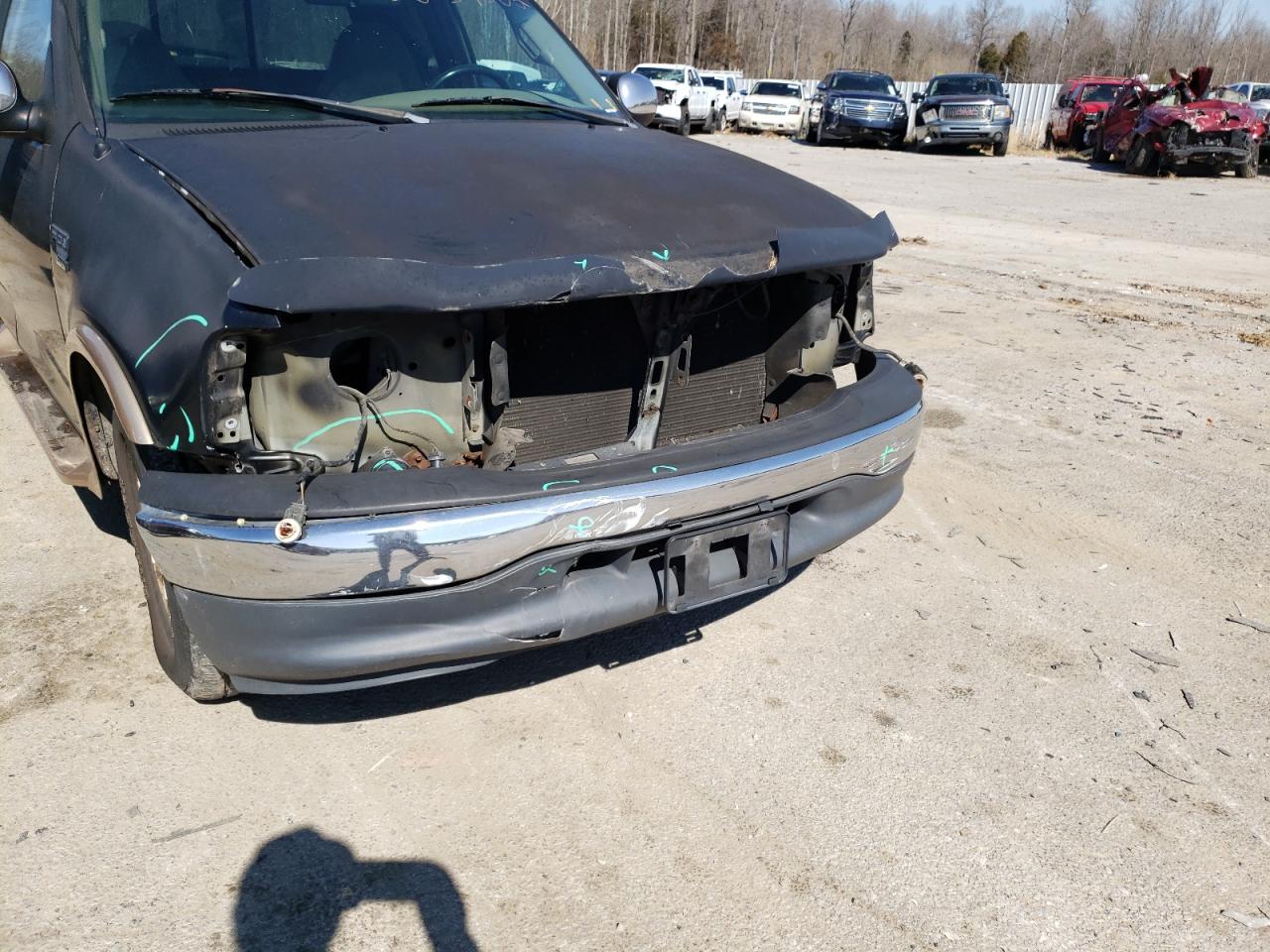 Photo 9 from auction – 2000 FORD F150 with VIN 2FTRX07W1YCA10781