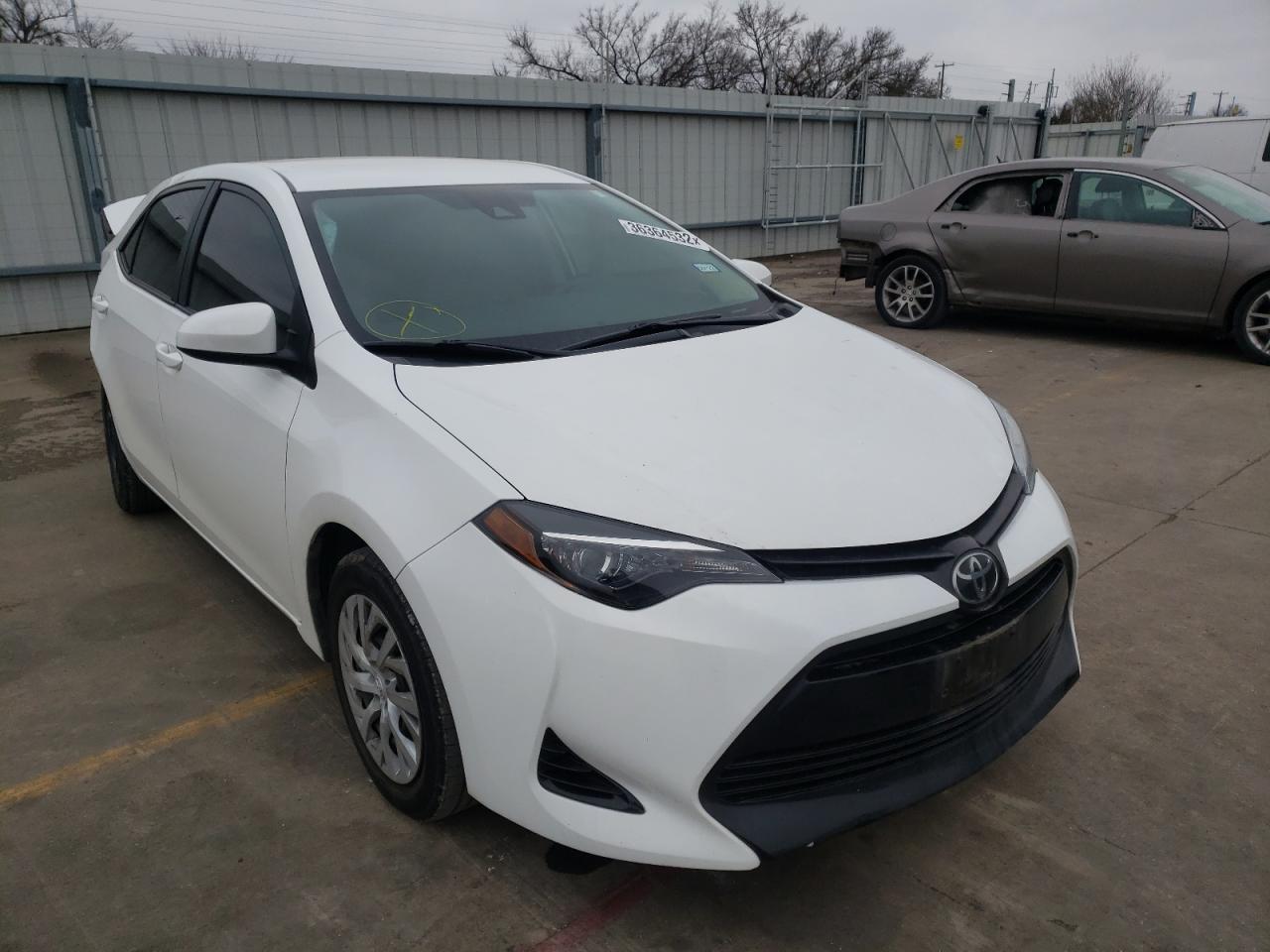 TOYOTA COROLLA L 2019 with VIN 5YFBURHE4KP865564 - Photo from auction