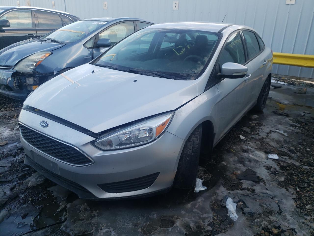 Photo 2 from auction – 2016 FORD FOCUS SE with VIN 1FADP3F24GL329628