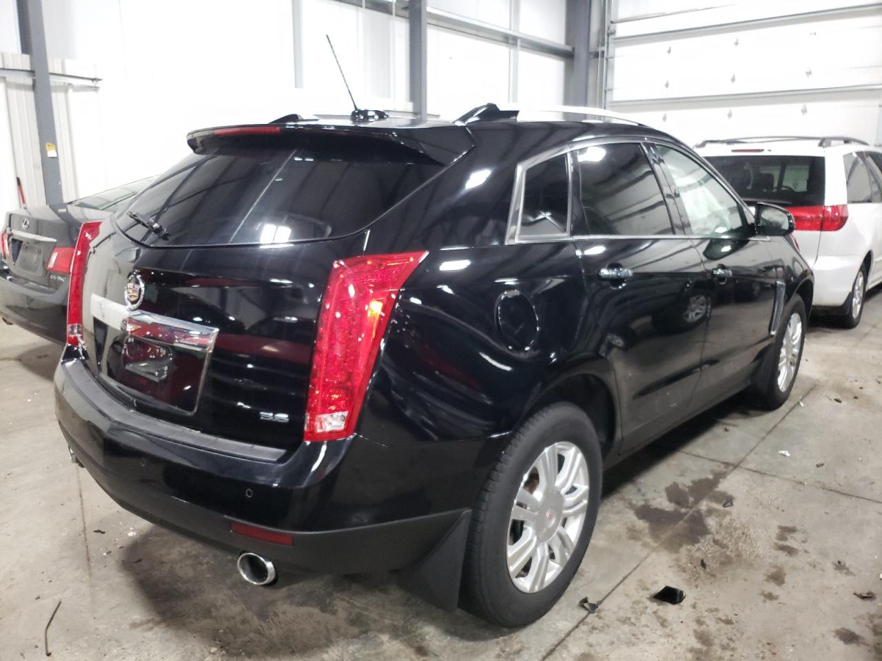 Photo 4 from auction – 2015 CADILLAC SRX LUXURY with VIN 3GYFNEE32FS527562