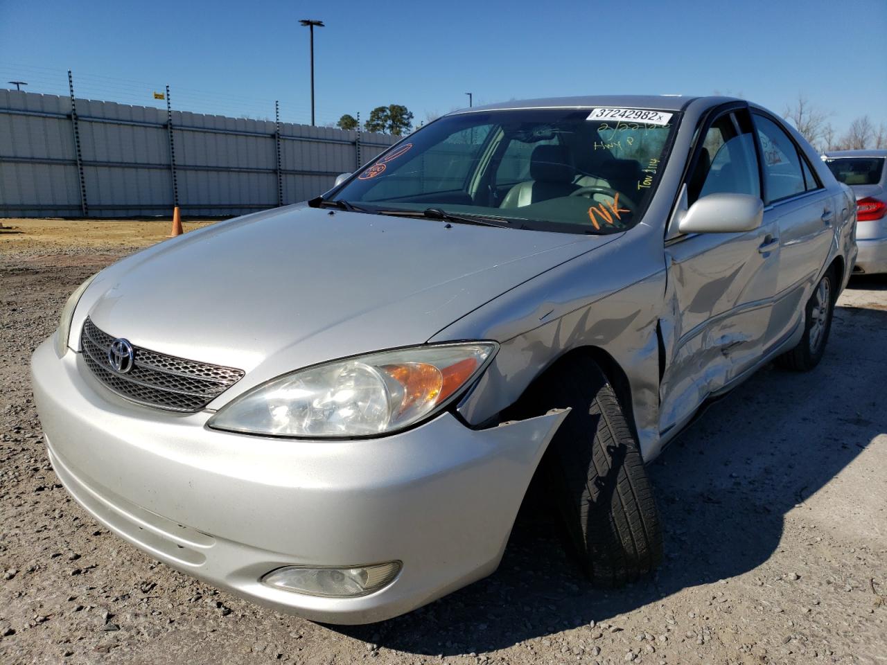 Photo 9 from auction – 2003 TOYOTA CAMRY LE with VIN 4T1BE30K93U210814