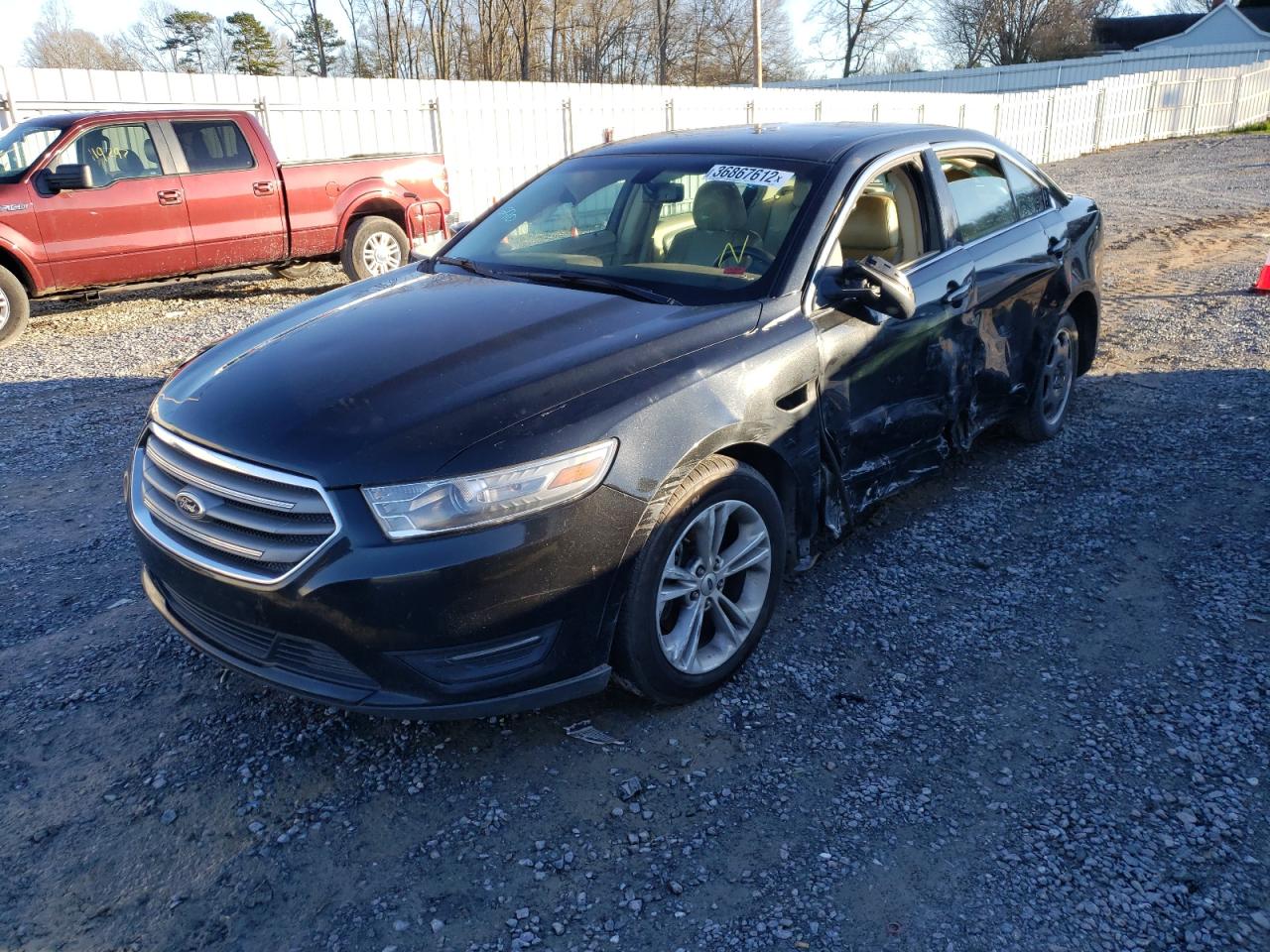 Photo 2 from auction – 2014 FORD TAURUS SEL with VIN 1FAHP2E83EG130528