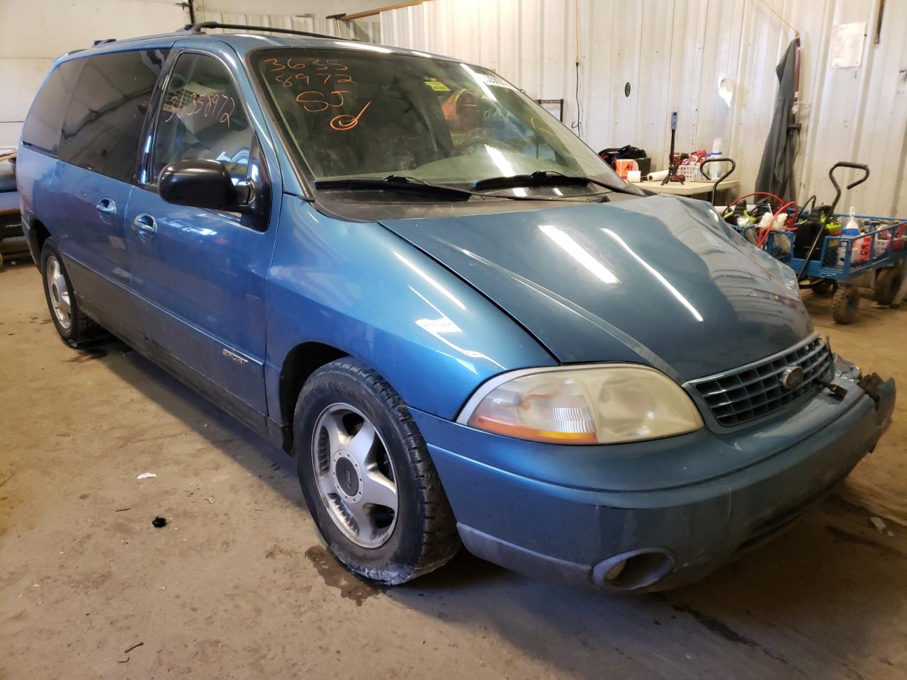 FORD WINDSTAR S 2003 with VIN 2FMZA57443BB08212 - Photo from auction
