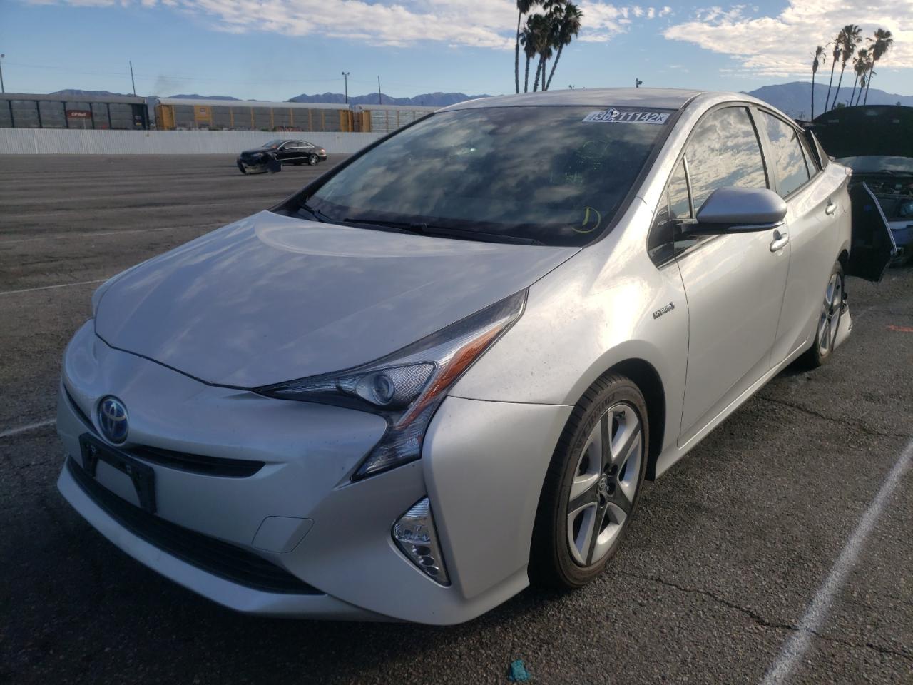 Photo 2 from auction – 2016 TOYOTA PRIUS with VIN JTDKARFU2G3006606