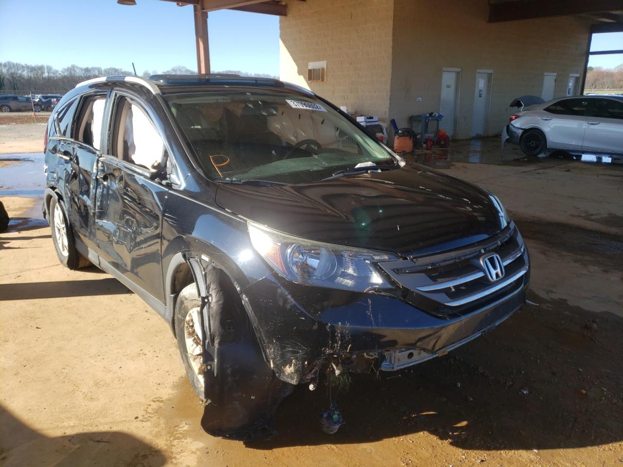 HONDA CR-V EXL 2013 with VIN 2HKRM4H74DH653668 - Photo from auction