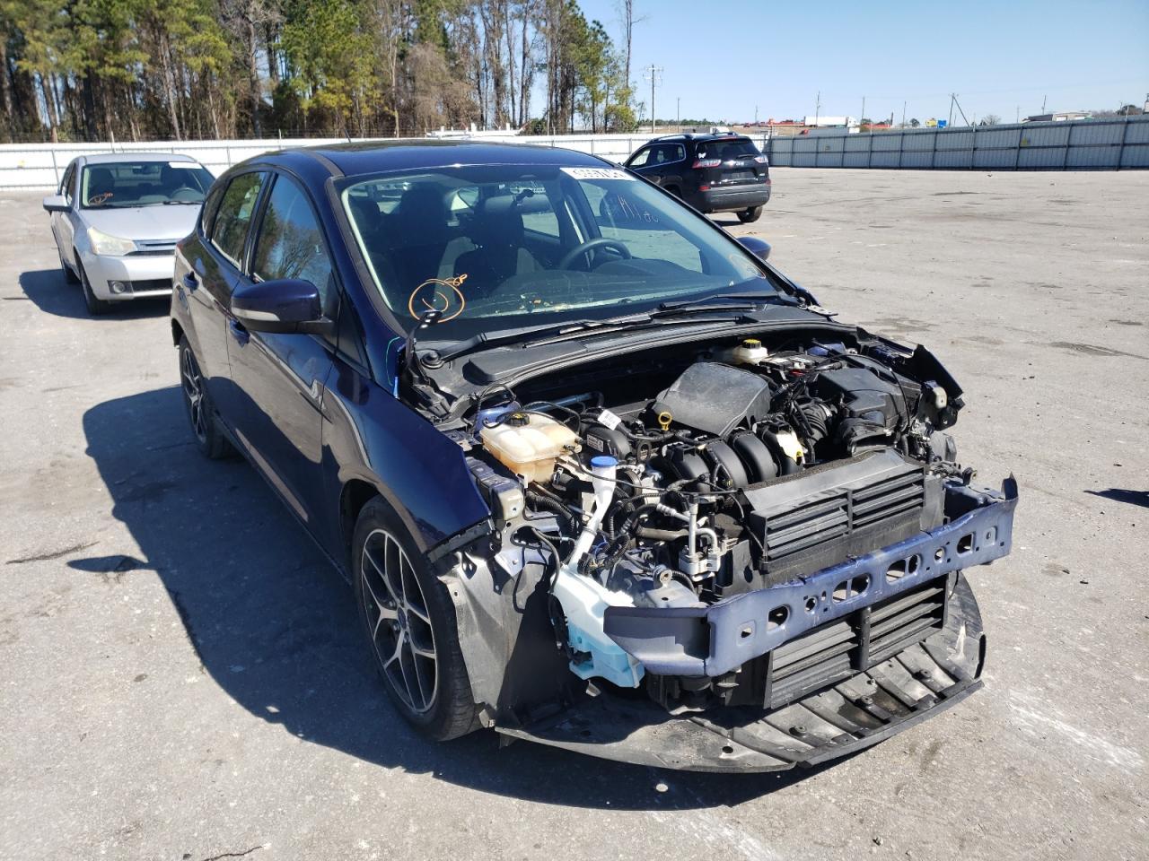FORD FOCUS SEL 2017 with VIN 1FADP3M27HL227759 - Photo from auction