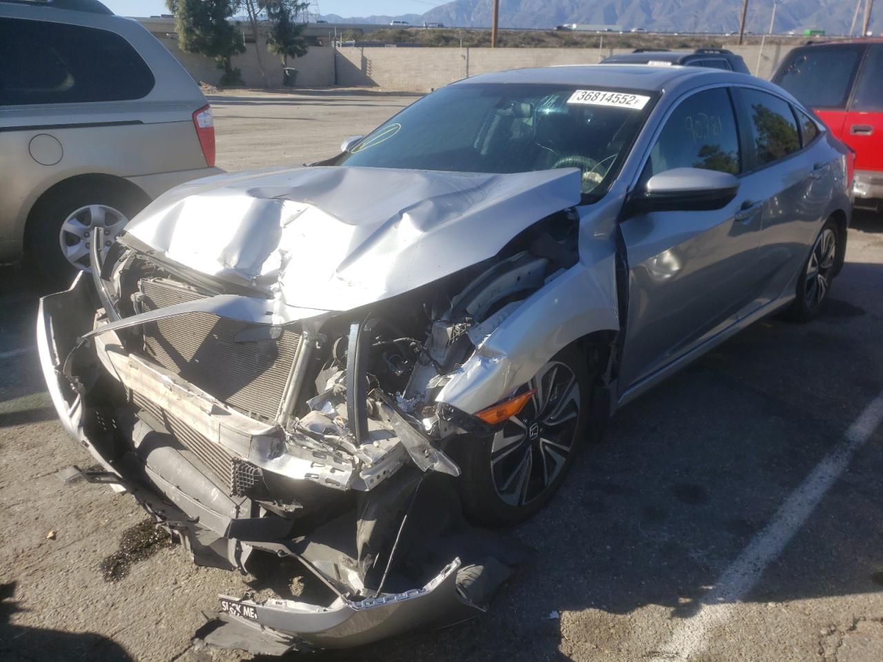 Photo 2 from auction – 2016 HONDA CIVIC EX with VIN 2HGFC1F33GH632409