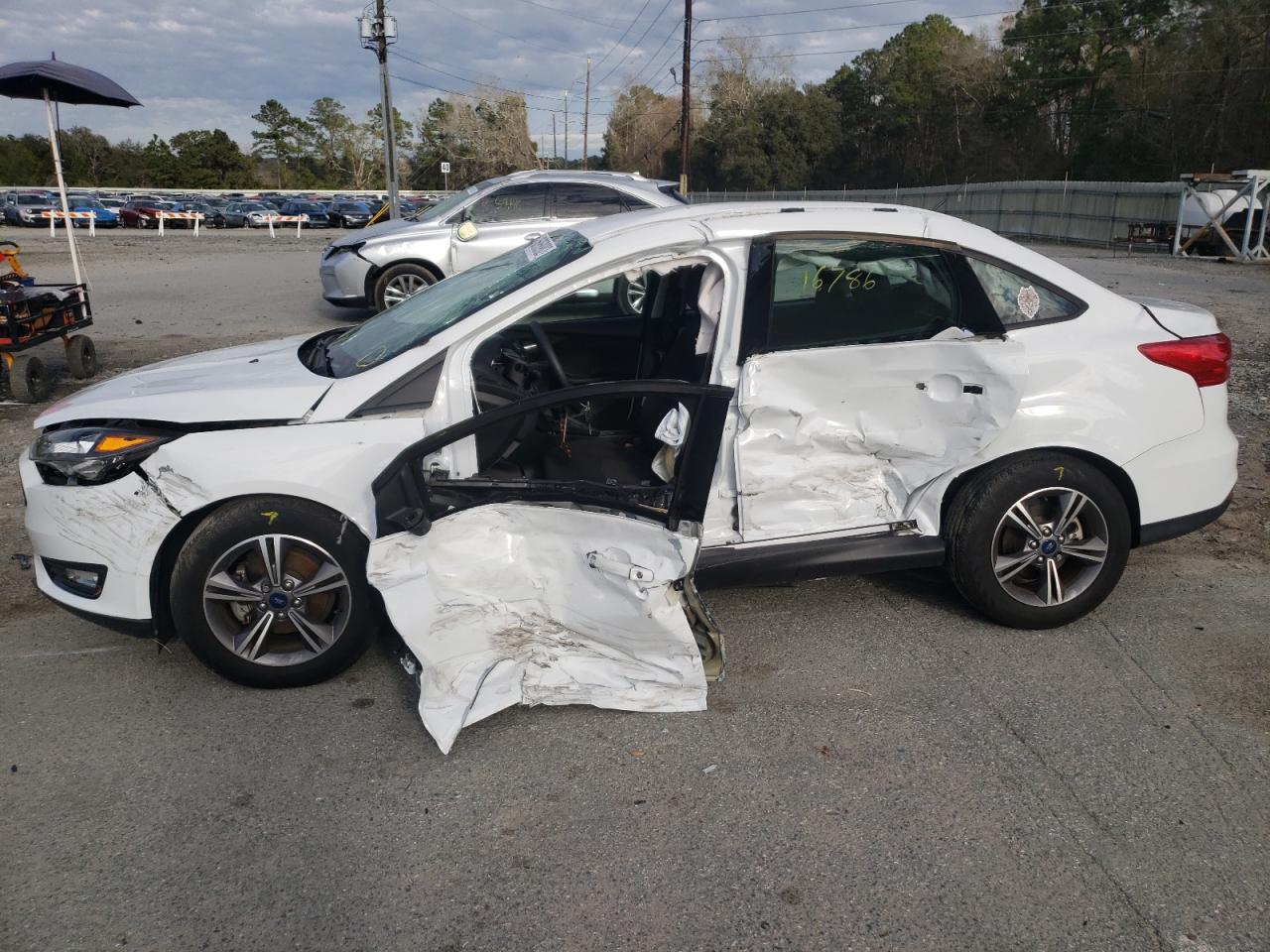 Photo 9 from auction – 2018 FORD FOCUS SE with VIN 1FADP3FE6JL201893