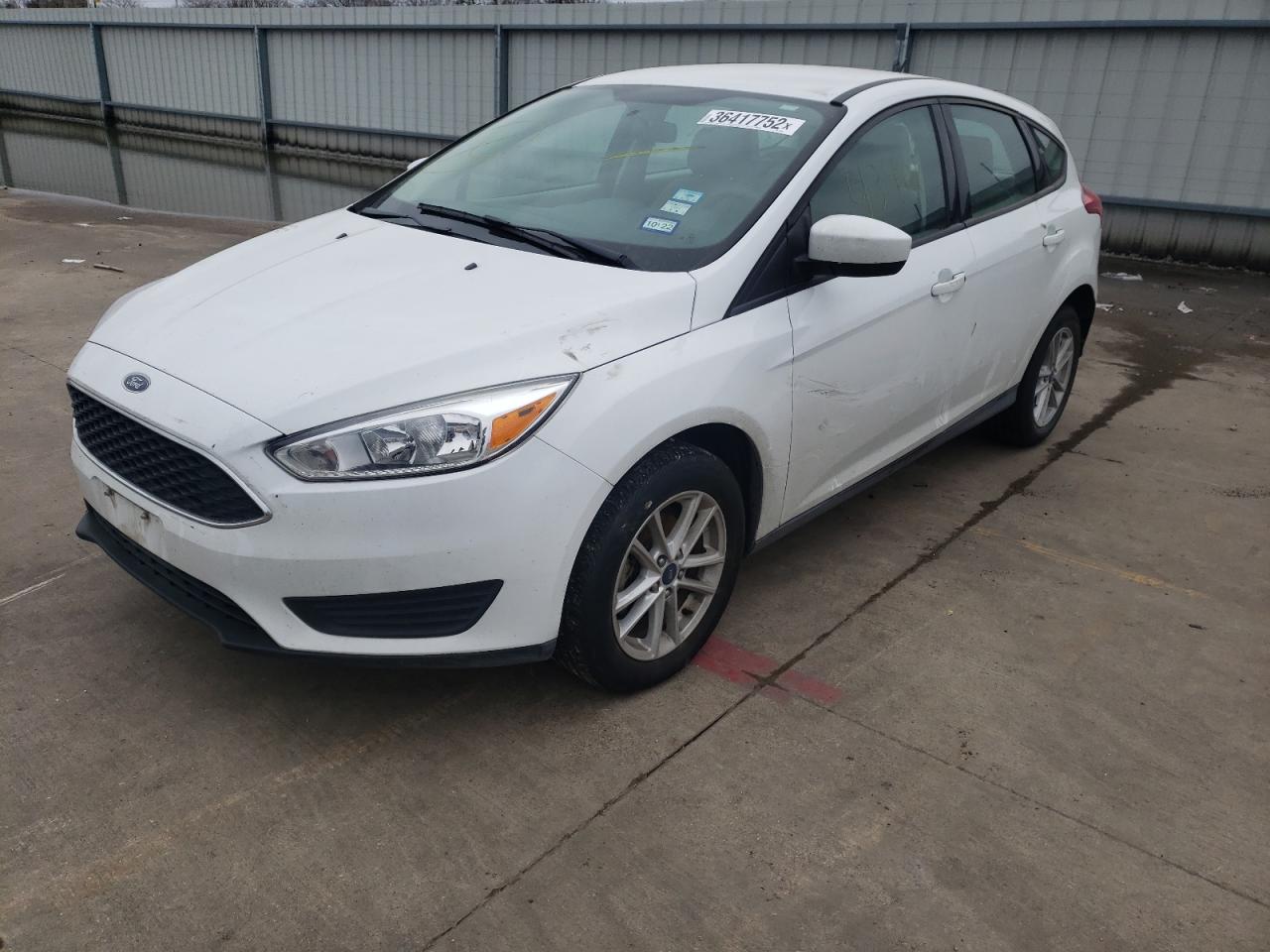 Photo 2 from auction – 2018 FORD FOCUS SE with VIN 1FADP3K24JL325690