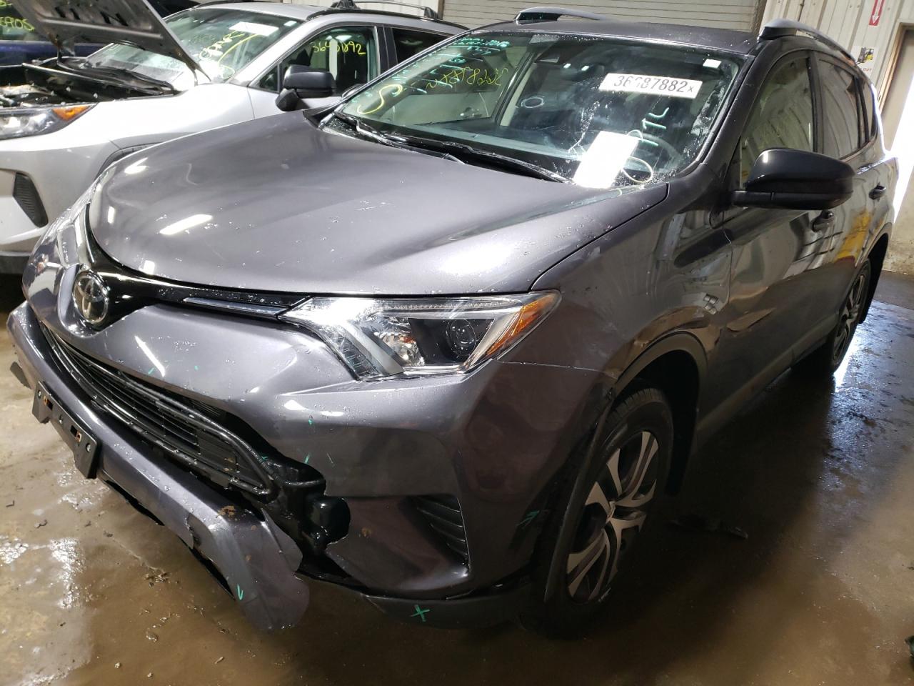 Photo 2 from auction – 2017 TOYOTA RAV4 LE with VIN JTMBFREV7HJ126118