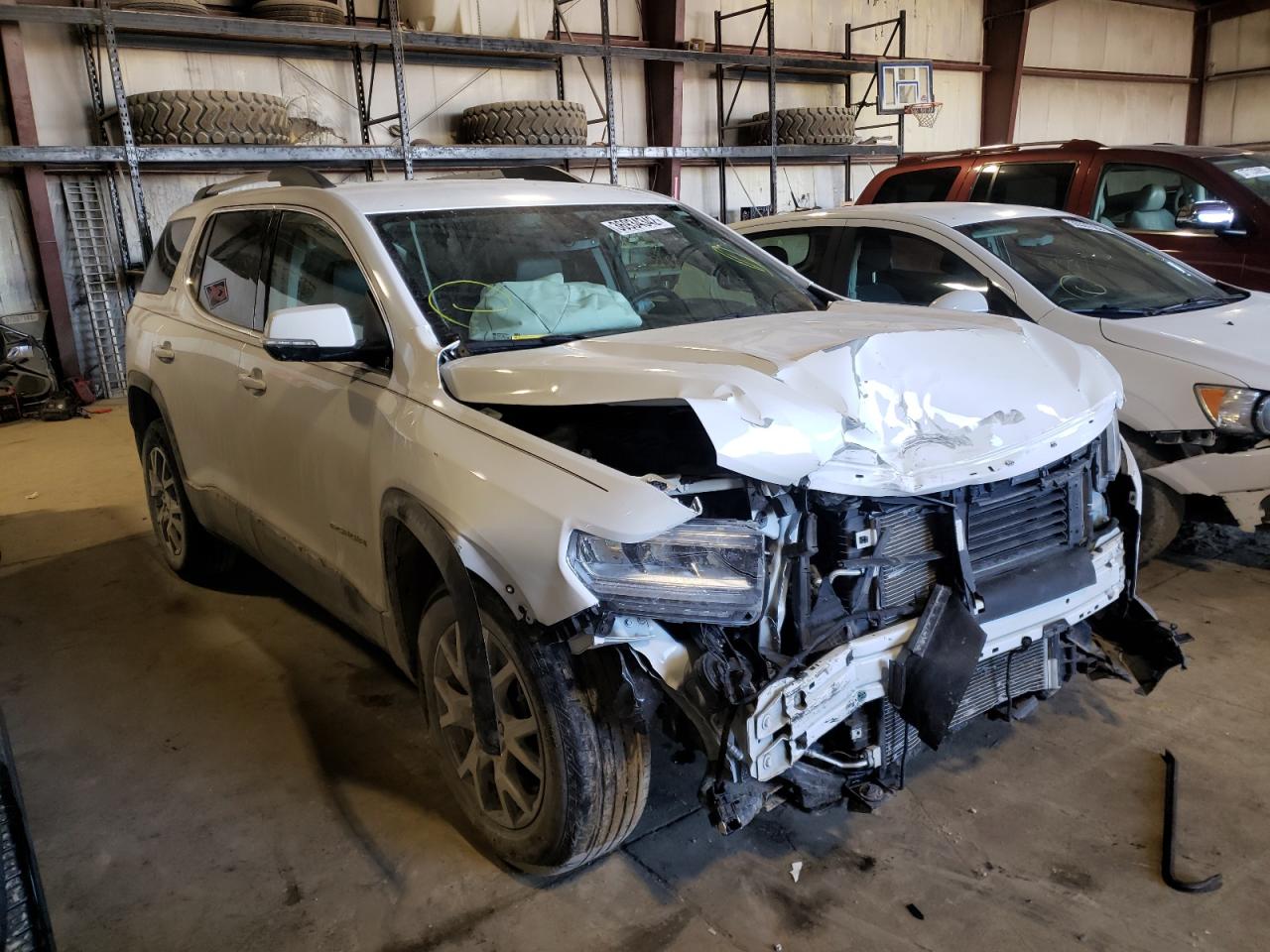 GMC ACADIA SLT 2020 with VIN 1GKKNULS9LZ122343 - Photo from auction