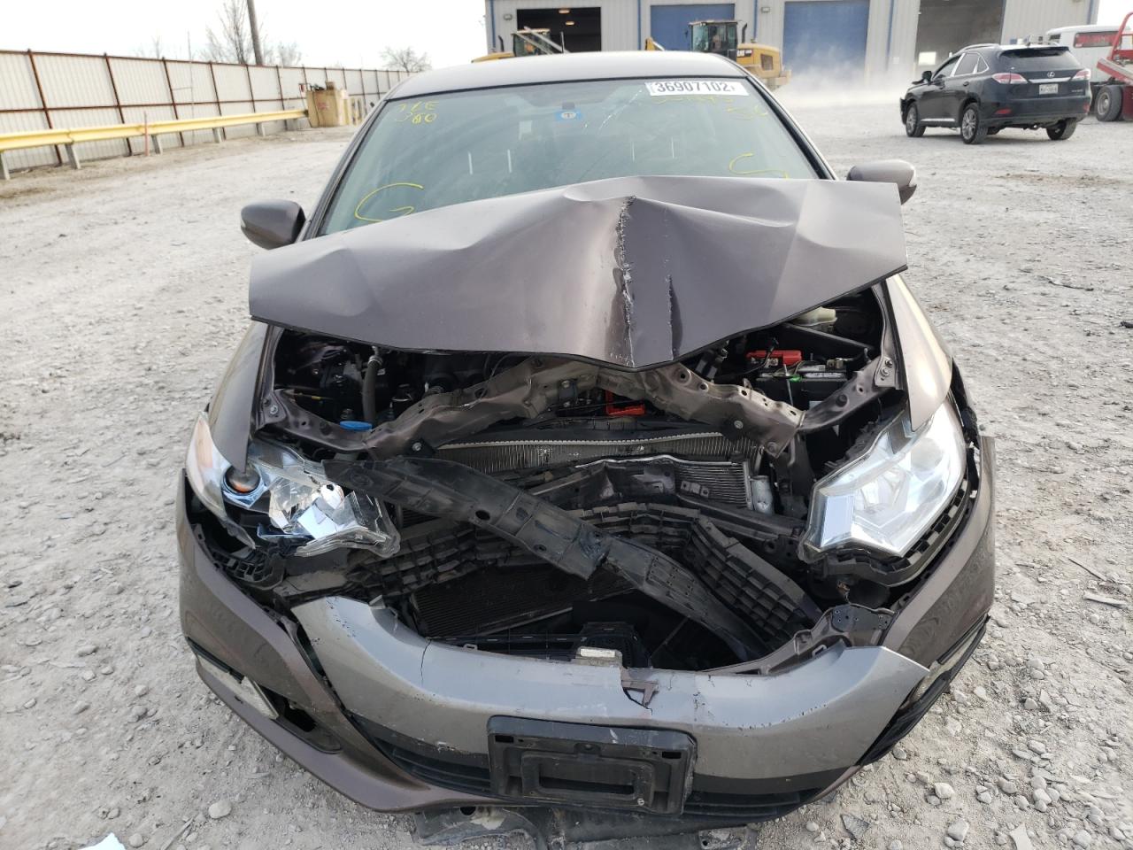 Photo 9 from auction – 2014 HONDA INSIGHT EX with VIN JHMZE2H79ES001695