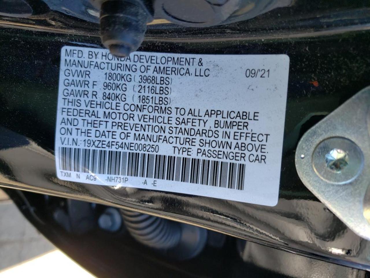 Photo 10 from auction – 2022 HONDA INSIGHT EX with VIN 19XZE4F54NE008250
