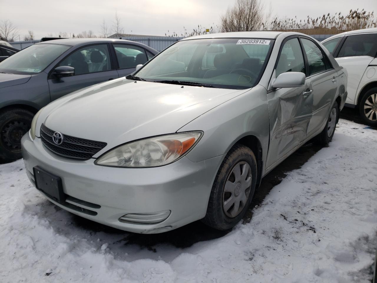 Photo 14 from auction – 2002 TOYOTA CAMRY LE with VIN JTDBE32K720095279