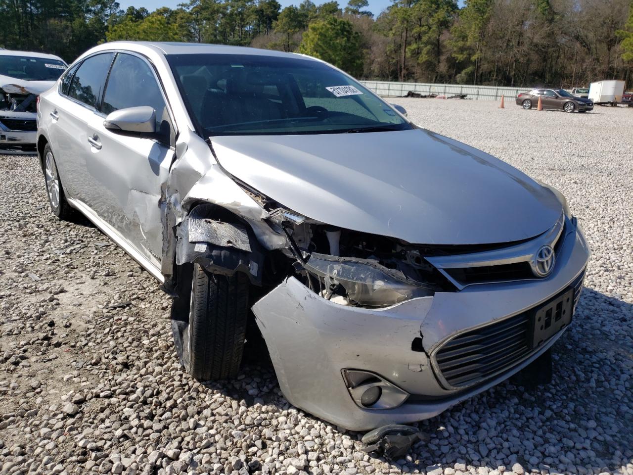 TOYOTA AVALON HYB 2014 with VIN 4T1BD1EB5EU034024 - Photo from auction
