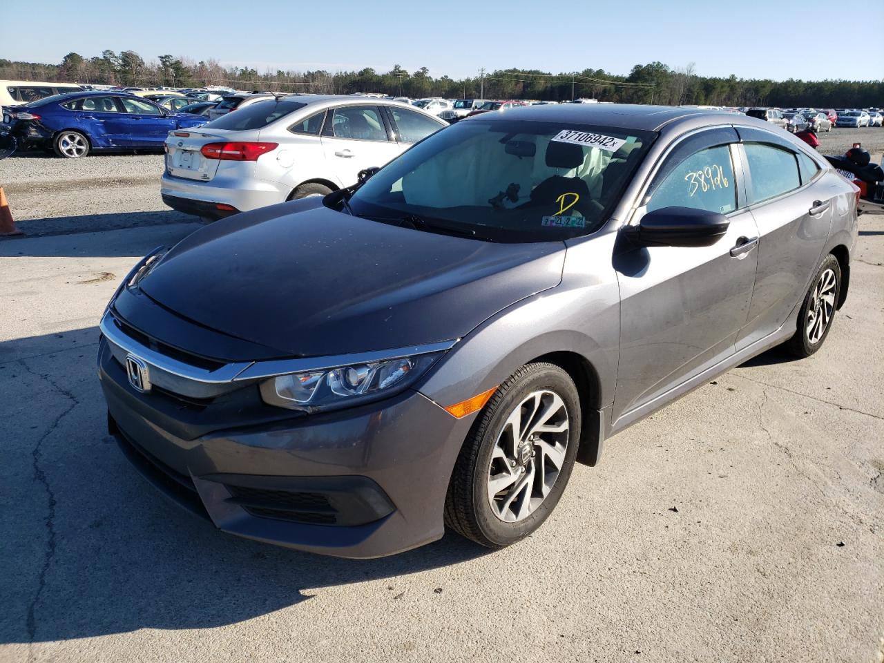 Photo 2 from auction – 2018 HONDA CIVIC EX with VIN 2HGFC2F7XJH596296