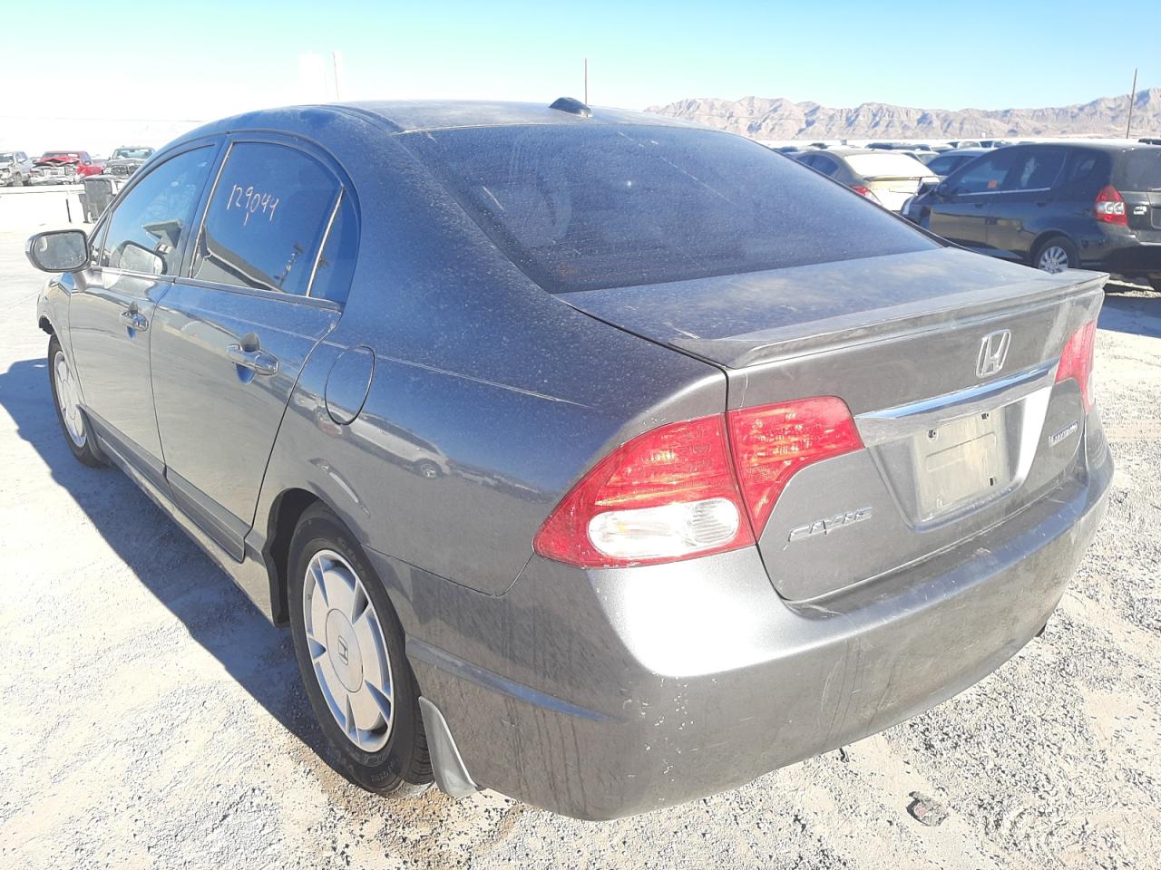 Photo 3 from auction – 2010 HONDA CIVIC HYBR with VIN JHMFA3F26AS004432