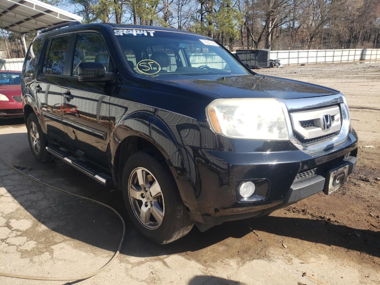 HONDA PILOT EXLN 2011 with VIN 5FNYF3H70BB018331 - Photo from auction