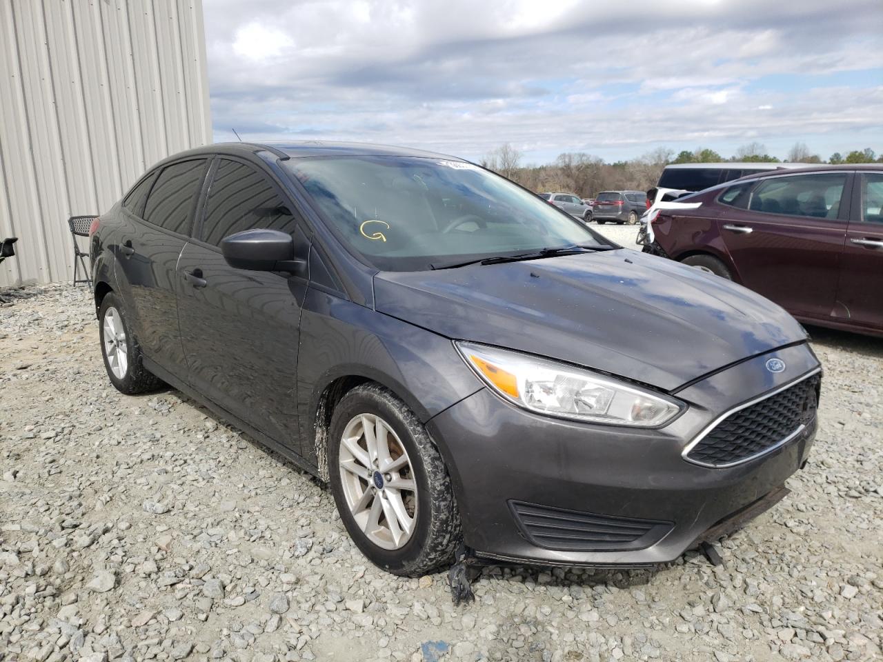 FORD FOCUS SE 2018 with VIN 1FADP3F25JL280348 - Photo from auction