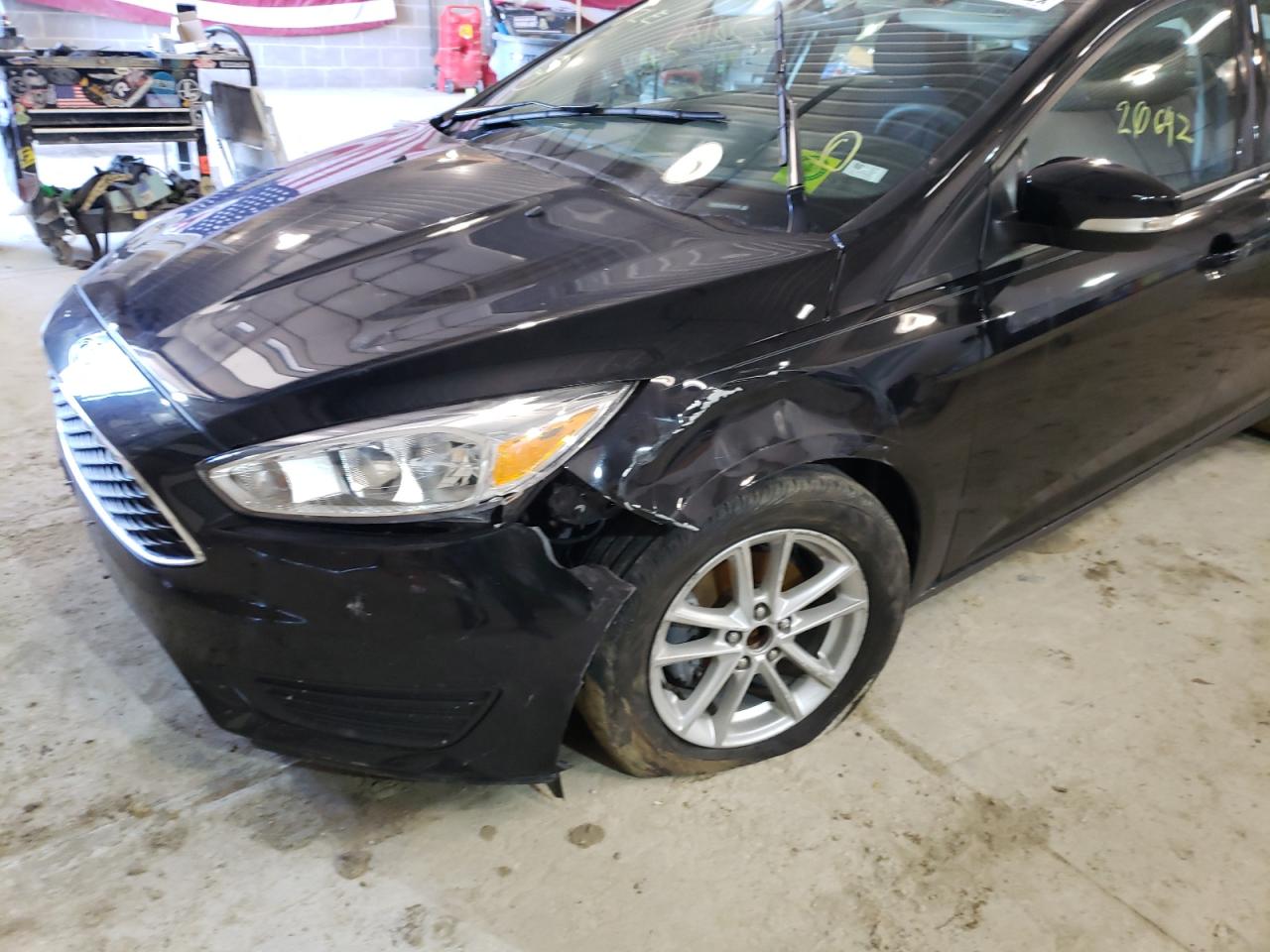 Photo 9 from auction – 2016 FORD FOCUS SE with VIN 1FADP3F23GL310150