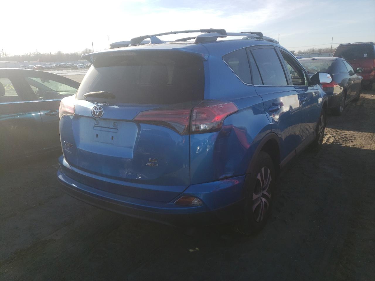 Photo 4 from auction – 2016 TOYOTA RAV4 LE with VIN 2T3BFREV2GW505284