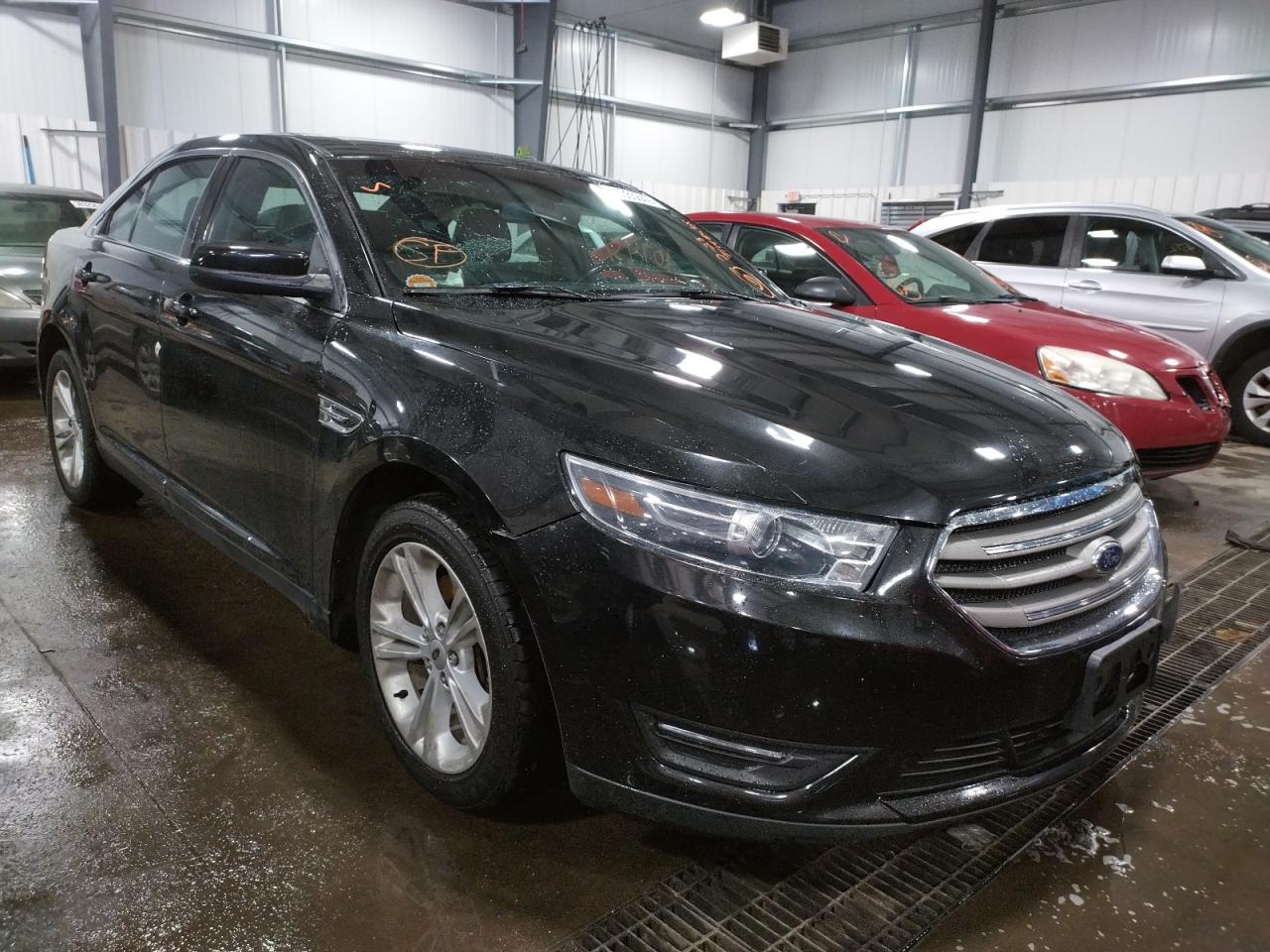 FORD TAURUS SEL 2015 with VIN 1FAHP2E88FG140716 - Photo from auction