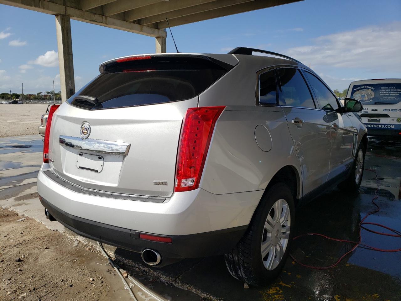 Photo 4 from auction – 2015 CADILLAC SRX with VIN 3GYFNAE31FS608710