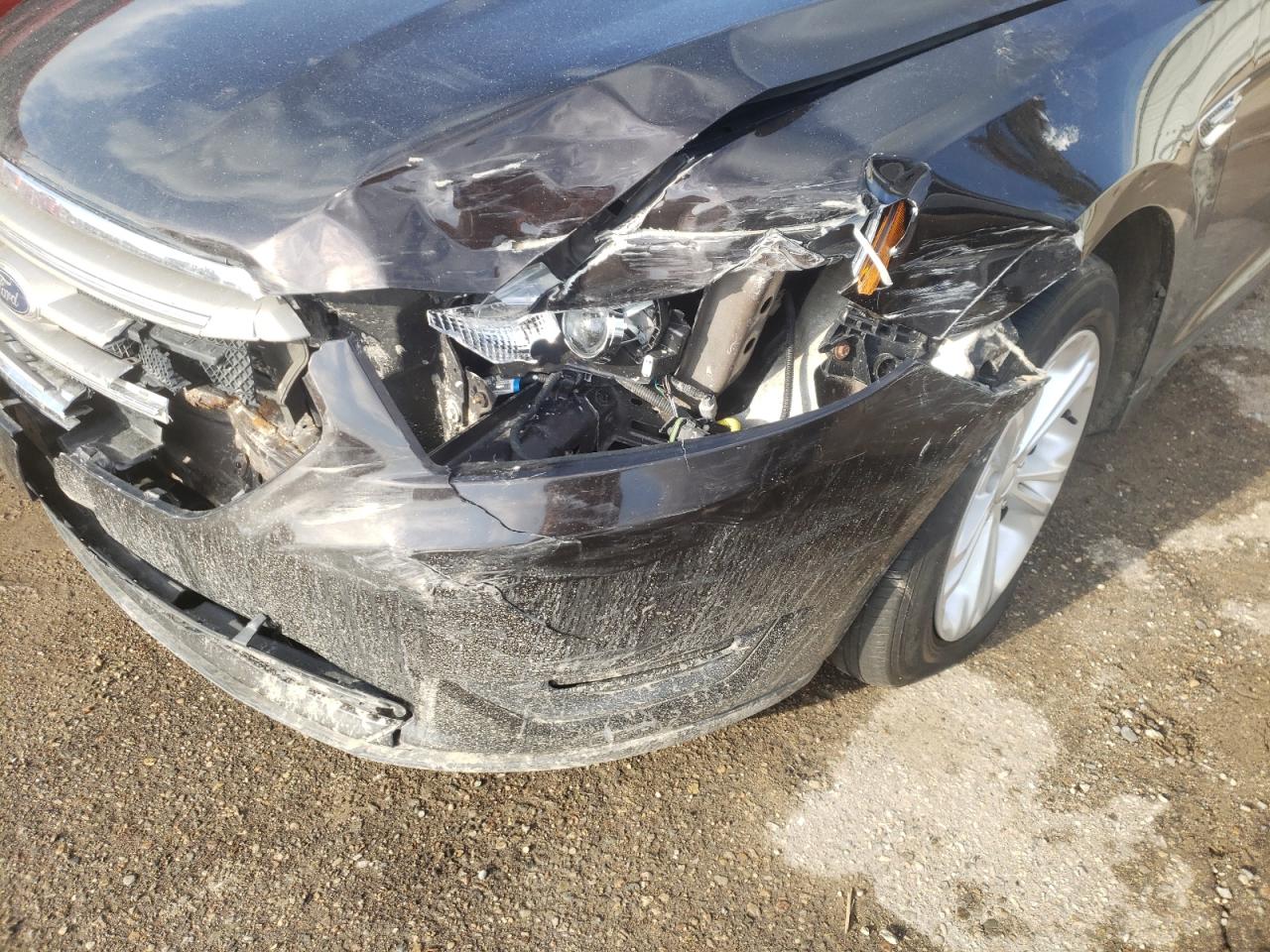 Photo 9 from auction – 2014 FORD TAURUS SEL with VIN 1FAHP2E88EG127138