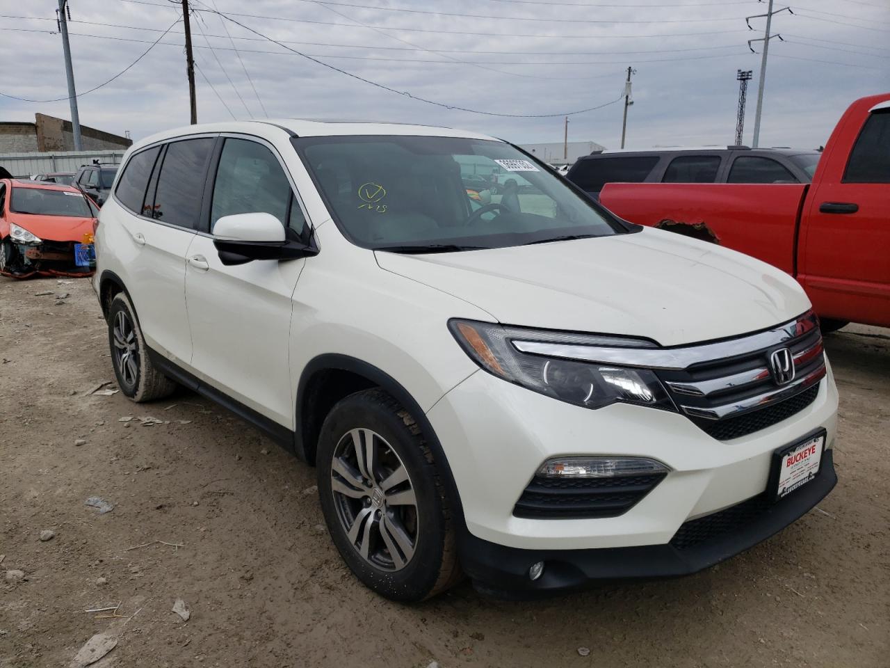 HONDA PILOT EXL 2016 with VIN 5FNYF6H80GB045899 - Photo from auction