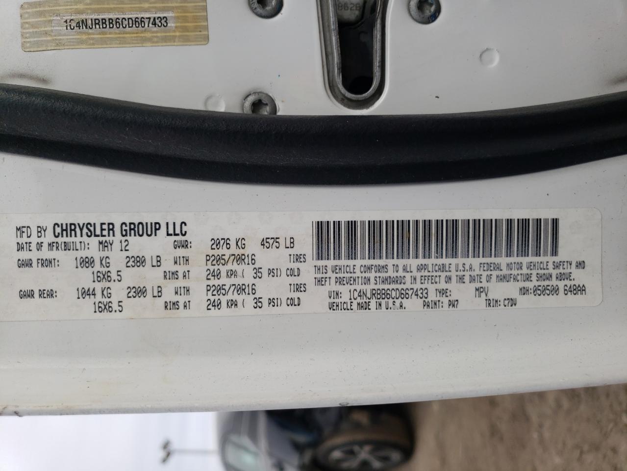 Photo 10 from auction – 2012 JEEP PATRIOT SP with VIN 1C4NJRBB6CD667433