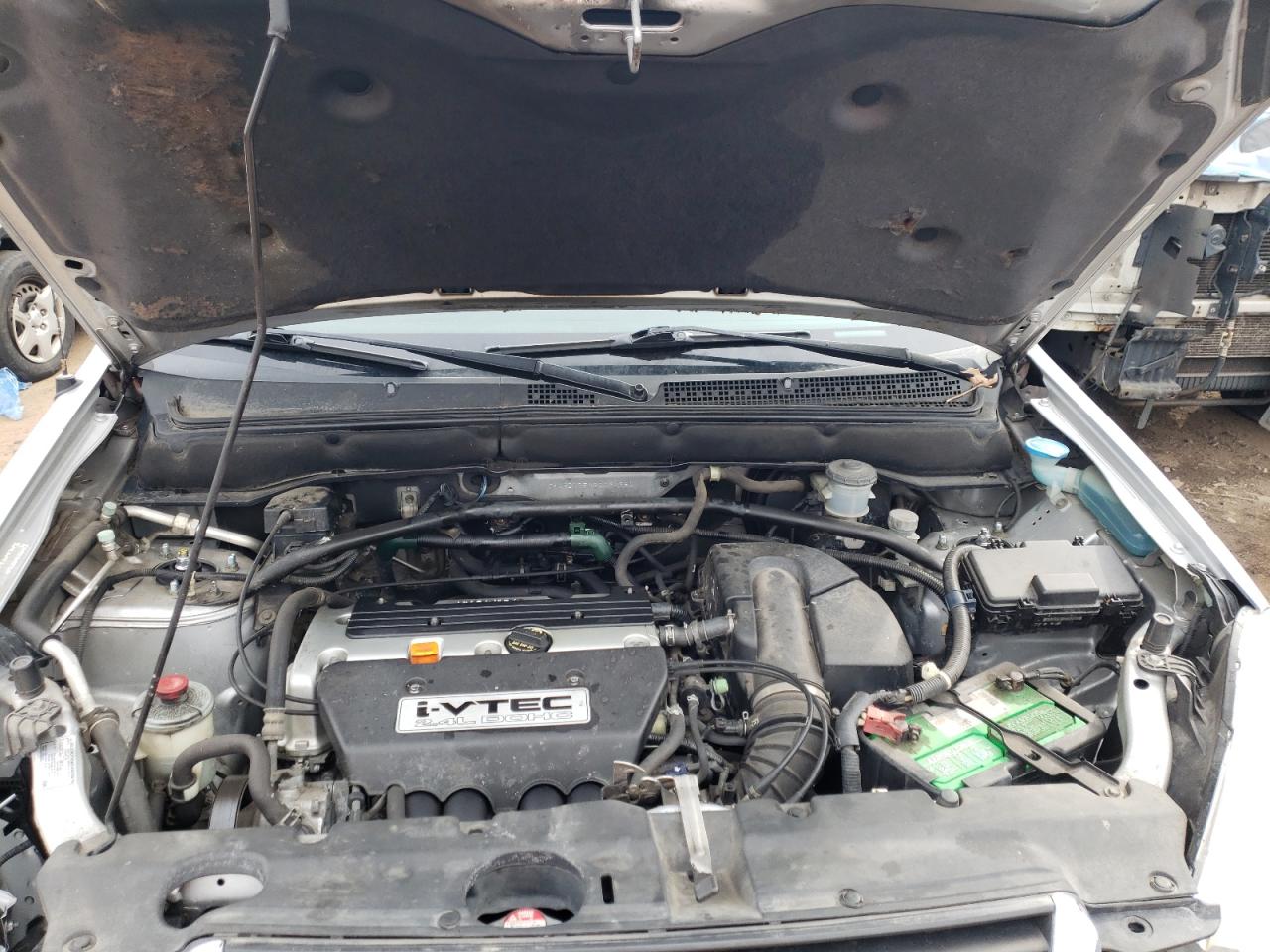 Photo 7 from auction – 2002 HONDA CR-V LX with VIN JHLRD77542C094250