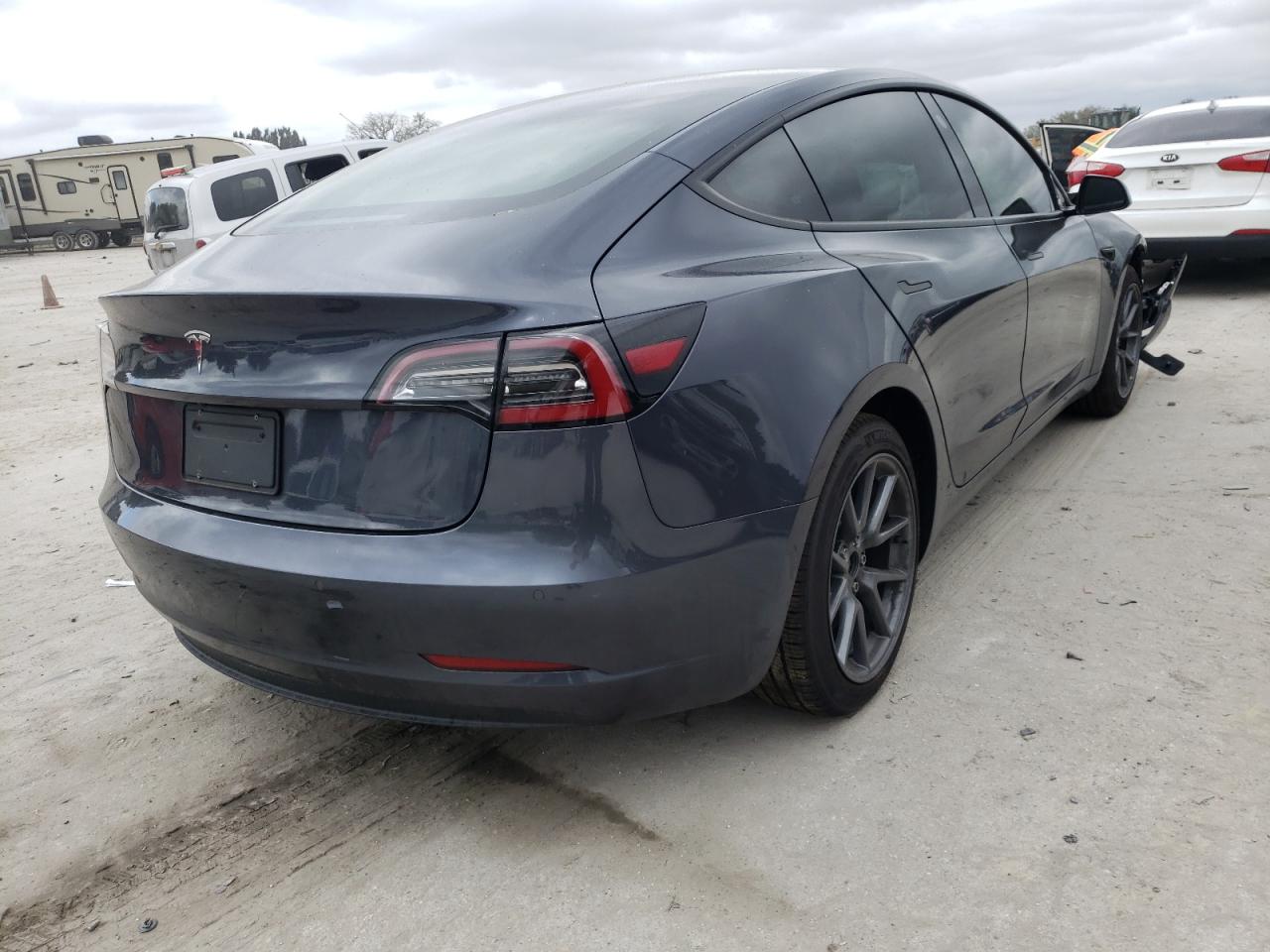 Photo 4 from auction – 2021 TESLA MODEL 3 with VIN 5YJ3E1EAXMF014579