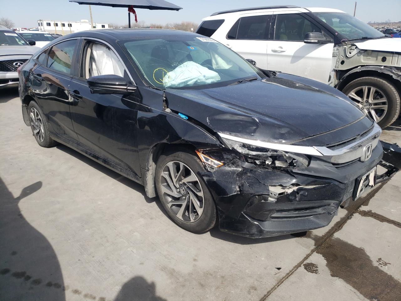 HONDA CIVIC EX 2017 with VIN 19XFC2F75HE067827 - Photo from auction