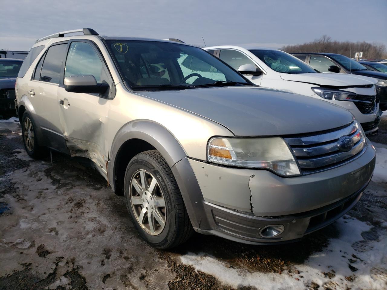 FORD TAURUS X S 2009 with VIN 1FMDK05W99GA04864 - Photo from auction