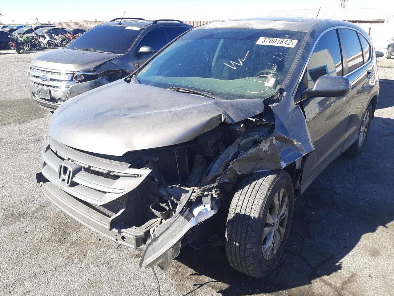 Photo 2 from auction – 2014 HONDA CR-V EX with VIN 2HKRM3H54EH509922