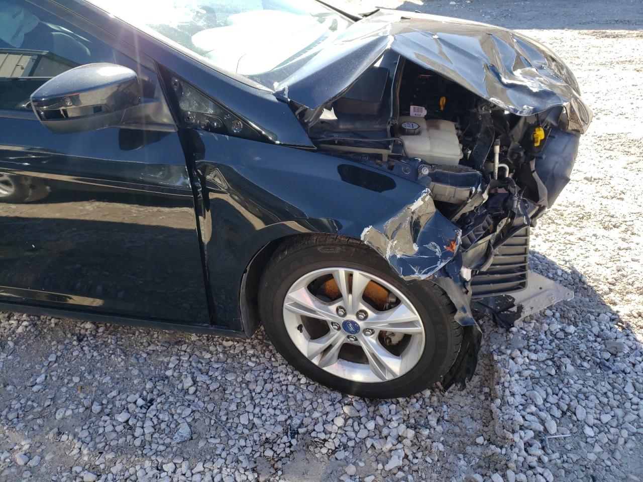 Photo 9 from auction – 2013 FORD FOCUS SE with VIN 1FADP3K27DL177233