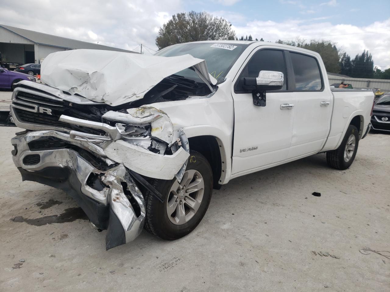 Photo 2 from auction – 2020 RAM 1500 LARAM with VIN 1C6SRFRTXLN346943