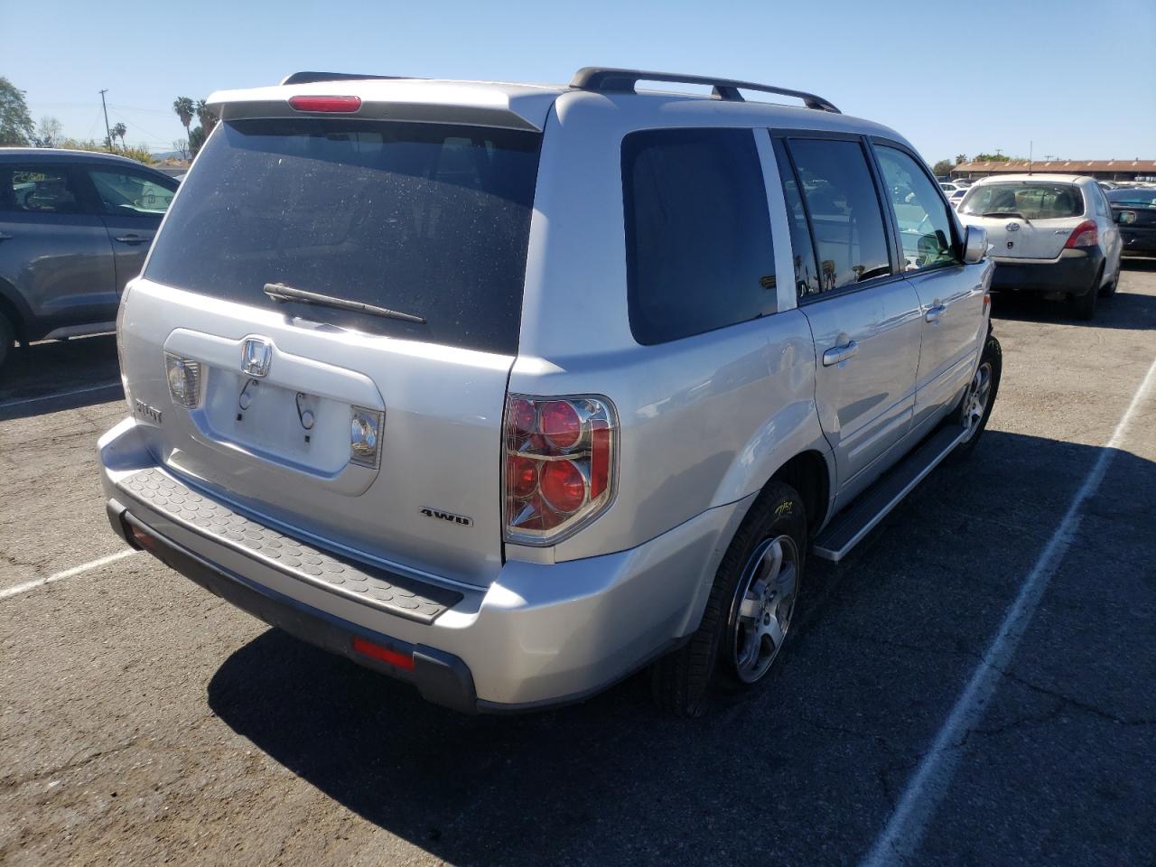 Photo 4 from auction – 2006 HONDA PILOT EX with VIN 2HKYF18426H524499