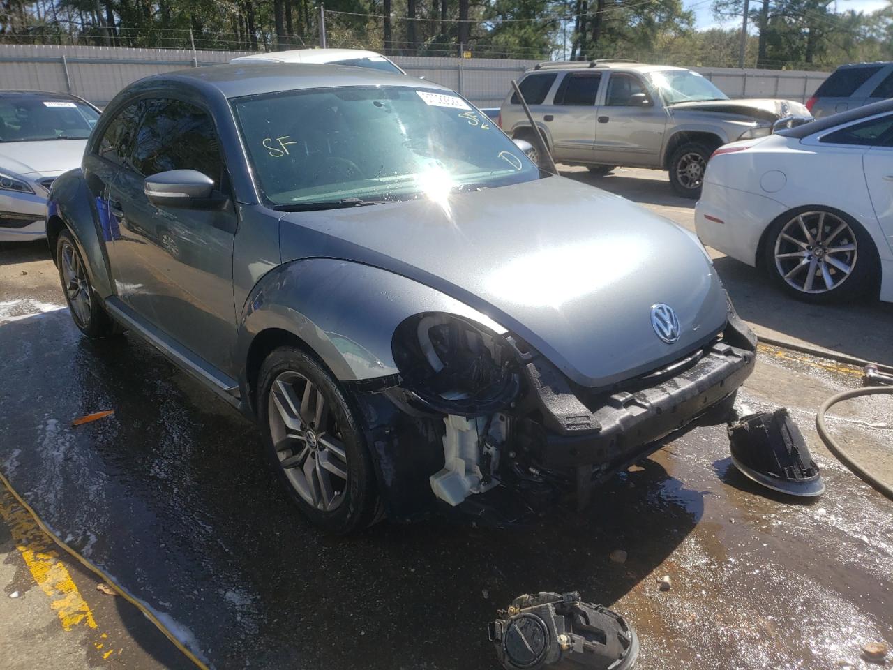 VOLKSWAGEN BEETLE 2012 with VIN 3VWJP7AT9CM617204 - Photo from auction