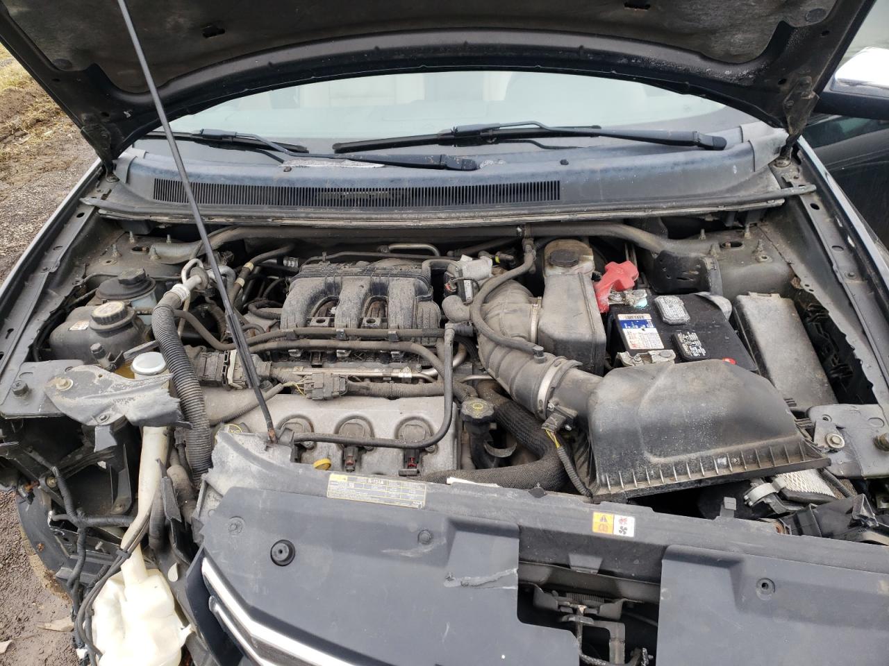 Photo 7 from auction – 2008 FORD TAURUS X L with VIN 1FMDK06W18GA11367
