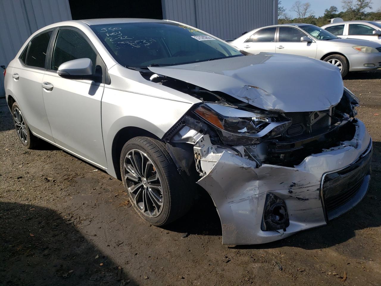 TOYOTA COROLLA L 2015 with VIN 5YFBURHE8FP248853 - Photo from auction
