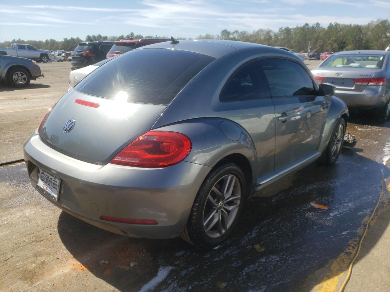 Photo 4 from auction – 2012 VOLKSWAGEN BEETLE with VIN 3VWJP7AT9CM617204