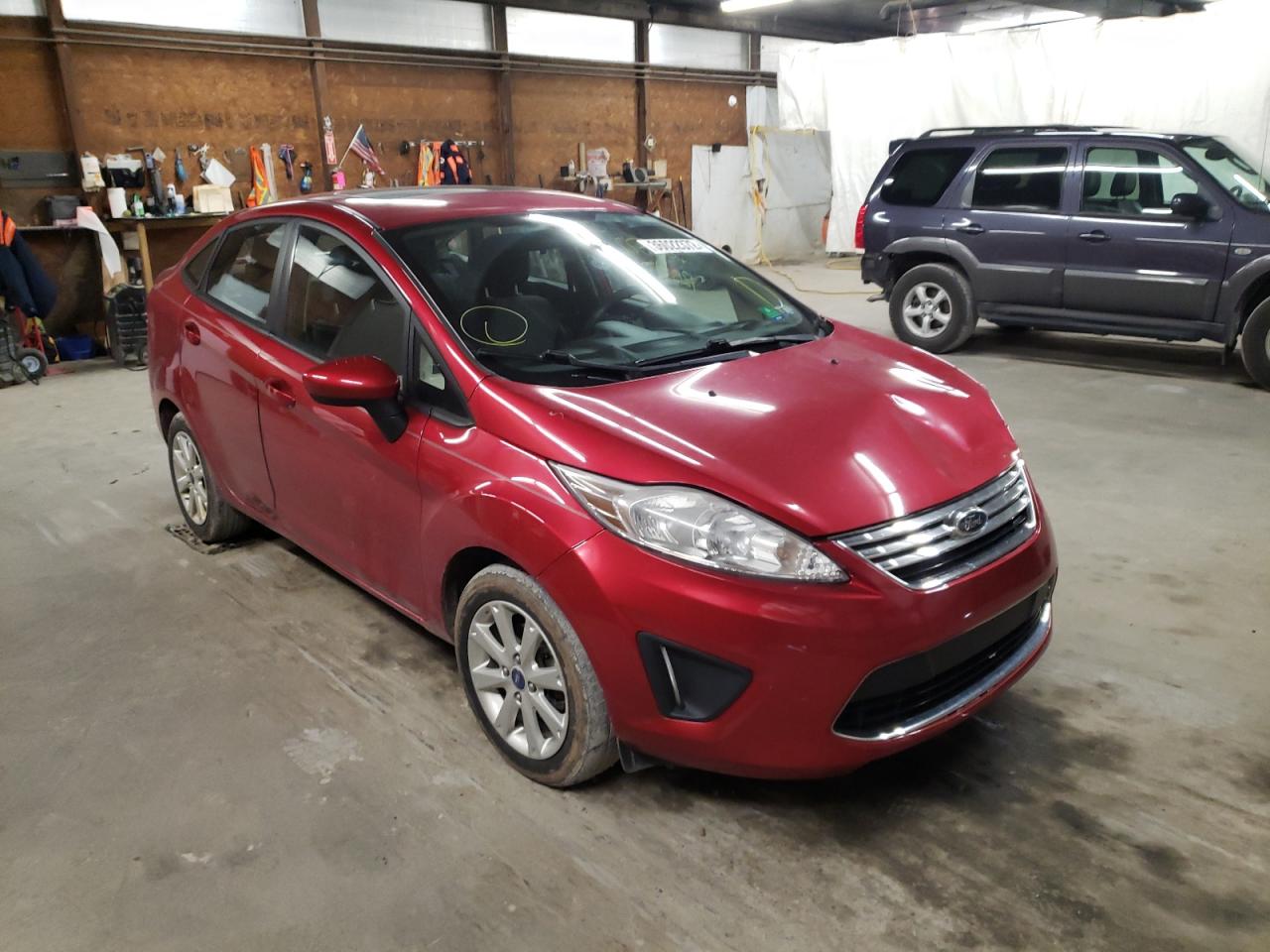 FORD FIESTA SE 2012 with VIN 3FADP4BJ2CM128550 - Photo from auction